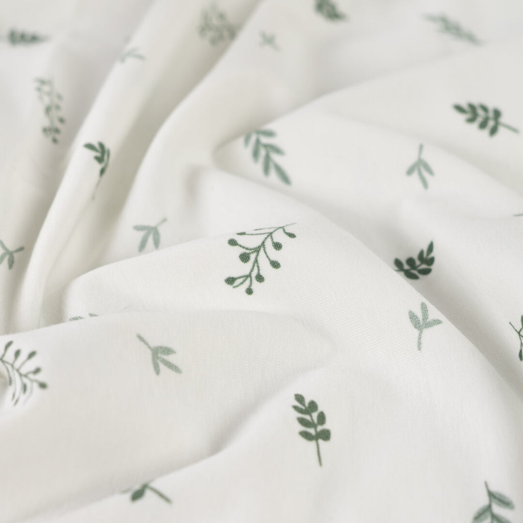 Jersey "Leaves" - ecru/pastell
